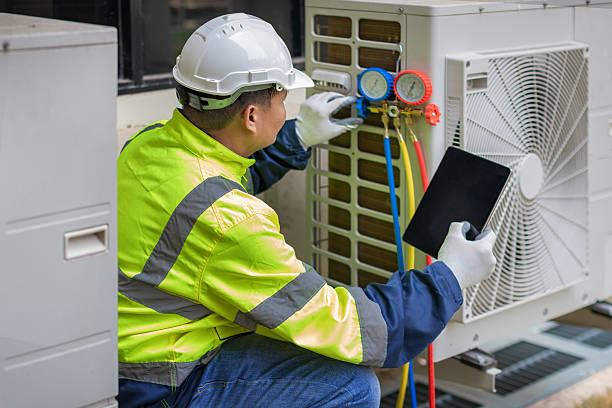Professional Heat Pump Repair technician working in Rosman, NC